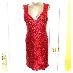 Sizzling red sequined dress size large. Open back.
